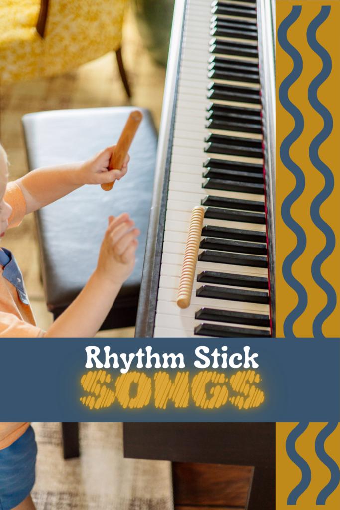 Child with rhythm sticks on piano