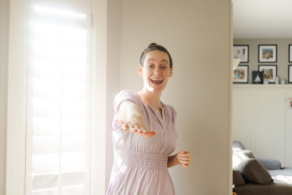 A women singing the action song hokey pokey